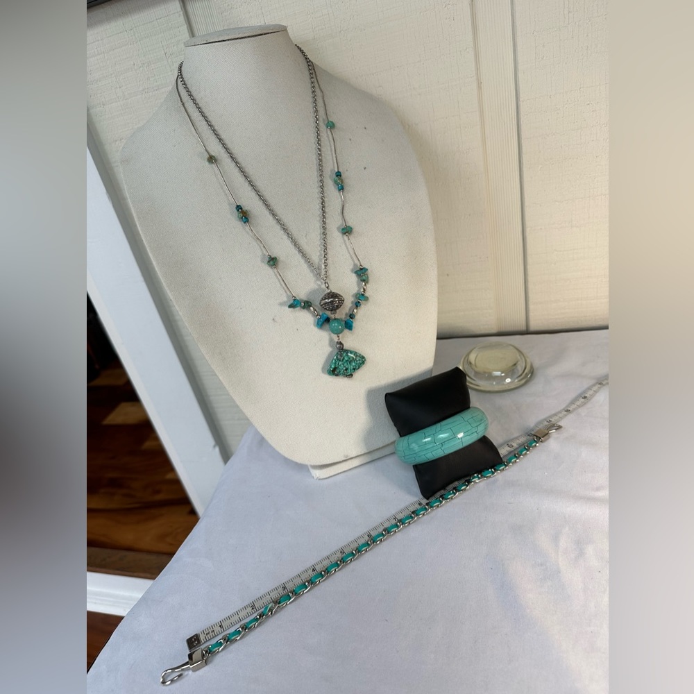 Group of light turquoise blue necklaces and bracelet